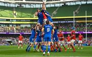 13 May 2023; Jack O'Donoghue of Munster wins a lineout from Jason Jenkins and Ryan Baird of Leinster during the United Rugby Championship Semi-Final match between Leinster and Munster at the Aviva Stadium in Dublin. Photo by Brendan Moran/Sportsfile