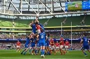 13 May 2023; Jack O'Donoghue of Munster wins a lineout from Jason Jenkins and Ryan Baird of Leinster during the United Rugby Championship Semi-Final match between Leinster and Munster at the Aviva Stadium in Dublin. Photo by Brendan Moran/Sportsfile