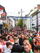14 May 2023; Supporters walk down Fermanagh road before the Ulster GAA Football Senior Championship Final match between Armagh and Derry at St Tiernach’s Park in Clones, Monaghan. Photo by Harry Murphy/Sportsfile