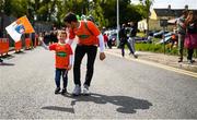 14 May 2023; Armagh supporters Shane McShane and his son Archie make their way to the stadium before the Ulster GAA Football Senior Championship Final match between Armagh and Derry at St Tiernach’s Park in Clones, Monaghan. Photo by Harry Murphy/Sportsfile