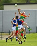 14 May 2023; Conor Doyle of Carlow contests the throw in against Pádraig O'Toole of Wicklow, centre, and Jack Kirwan during the Tailteann Cup Group 3 Round 1 match between Wicklow and Carlow at Echelon Park in Aughrim, Wicklow. Photo by Tyler Miller/Sportsfile