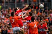 14 May 2023; Brendan Rogers of Derry punches to score his side's first goal during the Ulster GAA Football Senior Championship Final match between Armagh and Derry at St Tiernach’s Park in Clones, Monaghan. Photo by Harry Murphy/Sportsfile