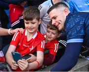 14 May 2023; Louth supporters Thias Sharkey, 9, and Harry Sharkey, 6, from Ardee take a selfie with Dublin goalkeeper Stephen Cluxton after the Leinster GAA Football Senior Championship Final match between Dublin and Louth at Croke Park in Dublin. Photo by Piaras Ó Mídheach/Sportsfile