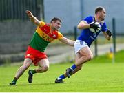 14 May 2023; Dean Healy of Wicklow in action against Ciaran Moran of Carlow during the Tailteann Cup Group 3 Round 1 match between Wicklow and Carlow at Echelon Park in Aughrim, Wicklow. Photo by Tyler Miller/Sportsfile