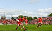 14 May 2023; Niall Loughlin of Derry in action against Jarly Óg Burns of Armagh during the Ulster GAA Football Senior Championship Final match between Armagh and Derry at St Tiernach’s Park in Clones, Monaghan. Photo by Harry Murphy/Sportsfile