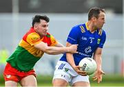14 May 2023; Paul McLoughlin of Wicklow in action against Jamie Clarke of Carlow during the Tailteann Cup Group 3 Round 1 match between Wicklow and Carlow at Echelon Park in Aughrim, Wicklow. Photo by Tyler Miller/Sportsfile