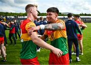 14 May 2023; Ross Dunphy of Carlow, left, celebrates with teammate Shane Clarke after their side's victory in the Tailteann Cup Group 3 Round 1 match between Wicklow and Carlow at Echelon Park in Aughrim, Wicklow. Photo by Tyler Miller/Sportsfile