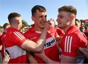 14 May 2023; Derry players, from left, Gareth McKinless, Shane McGuigan and Ethan Doherty after their side's victory in the Ulster GAA Football Senior Championship Final match between Armagh and Derry at St Tiernach’s Park in Clones, Monaghan. Photo by Harry Murphy/Sportsfile