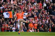 14 May 2023; Rian O'Neill of Armagh kicks a point to take the match to a penalty shootout during the Ulster GAA Football Senior Championship Final match between Armagh and Derry at St Tiernach’s Park in Clones, Monaghan. Photo by Harry Murphy/Sportsfile