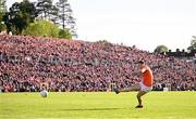 14 May 2023; Rian O'Neill of Armagh strikes a penalty in the penalty shoot-out in the Ulster GAA Football Senior Championship Final match between Armagh and Derry at St Tiernach’s Park in Clones, Monaghan. Photo by Ramsey Cardy/Sportsfile