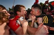 14 May 2023; Derry players Brendan Rogers, left, and goalkeeper Odhran Lynch celebrate after their victory in the Ulster GAA Football Senior Championship Final match between Armagh and Derry at St Tiernach’s Park in Clones, Monaghan. Photo by Ramsey Cardy/Sportsfile