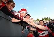 14 May 2023; Brendan Rogers of Derry celebrates with supporters after the Ulster GAA Football Senior Championship Final match between Armagh and Derry at St Tiernach’s Park in Clones, Monaghan. Photo by Ramsey Cardy/Sportsfile