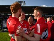 14 May 2023; Derry players, from left, Conor Glass, Gareth McKinless and Lachlan Murray after their side's victory in the Ulster GAA Football Senior Championship Final match between Armagh and Derry at St Tiernach’s Park in Clones, Monaghan. Photo by Harry Murphy/Sportsfile
