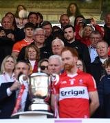 14 May 2023; Sinn Fein MLA Michelle O'Neill, top right, takes a photograph of the cup presentation during the Ulster GAA Football Senior Championship Final match between Armagh and Derry at St Tiernach’s Park in Clones, Monaghan. Photo by Harry Murphy/Sportsfile