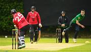 15 May 2023; Trent McKeegan of North West Warriors delivers to Murray Commins of Munster Reds during the Cricket Ireland Inter-Provincial Series match between Munster Reds and North West Warriors at The Mardyke in Cork. Photo by Eóin Noonan/Sportsfile