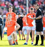 14 May 2023; Assistant referee Sean Hurson with Armagh penalty takers Rian O'Neill, Rory Grugan and Aidan Nugent during the penalty shoot-out in the Ulster GAA Football Senior Championship Final match between Armagh and Derry at St Tiernach’s Park in Clones, Monaghan.  Photo by Ramsey Cardy/Sportsfile