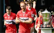 14 May 2023; Derry captain Conor Glass glances at the Anglo Celt Cup before the Ulster GAA Football Senior Championship Final match between Armagh and Derry at St Tiernach’s Park in Clones, Monaghan. Photo by Ramsey Cardy/Sportsfile
