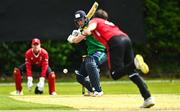 15 May 2023; Tyrone Kane of Munster Reds delivers to Shane Getkate of North West Warriors during the Cricket Ireland Inter-Provincial Series match between Munster Reds and North West Warriors at The Mardyke in Cork. Photo by Eóin Noonan/Sportsfile
