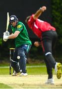 15 May 2023; Liam McCarthy of Munster Reds delivers to Shane Getkate of North West Warriors during the Cricket Ireland Inter-Provincial Series match between Munster Reds and North West Warriors at The Mardyke in Cork. Photo by Eóin Noonan/Sportsfile
