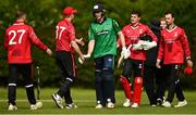 15 May 2023; Shane Getkate of North West Warriors shakes hands with Michael Granger of Munster Reds after the Cricket Ireland Inter-Provincial Series match between Munster Reds and North West Warriors at The Mardyke in Cork. Photo by Eóin Noonan/Sportsfile