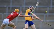 15 May 2023; Jack O'Neill of Clare in action against Michael Mullins of Cork during the oneills.com Munster GAA Hurling U20 Championship Final match between Cork and Clare at TUS Gaelic Grounds in Limerick. Photo by Piaras Ó Mídheach/Sportsfile