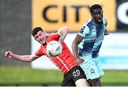 15 May 2023; Wasiri Williams of Dundalk in action against Cian Kavanagh of Derry City during the SSE Airtricity Men's Premier Division match between Derry City and Dundalk at The Ryan McBride Brandywell Stadium in Derry. Photo by Ramsey Cardy/Sportsfile