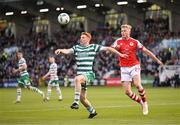 15 May 2023; Rory Gaffney of Shamrock Rovers in action against Jay McGrath of St Patrick's Athletic during the SSE Airtricity Men's Premier Division match between Shamrock Rovers and St Patrick's Athletic at Tallaght Stadium in Dublin. Photo by Stephen McCarthy/Sportsfile