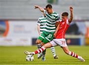 15 May 2023; Graham Burke of Shamrock Rovers is tackled by Adam Murphy of St Patrick's Athletic during the SSE Airtricity Men's Premier Division match between Shamrock Rovers and St Patrick's Athletic at Tallaght Stadium in Dublin. Photo by Tyler Miller/Sportsfile