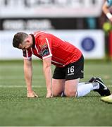 15 May 2023; Shane McEleney of Derry City before leaving the pitch with an injury during the SSE Airtricity Men's Premier Division match between Derry City and Dundalk at The Ryan McBride Brandywell Stadium in Derry. Photo by Ramsey Cardy/Sportsfile