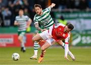 15 May 2023; Lee Grace of Shamrock Rovers is tackled by Jason McClelland of St Patrick's Athletic during the SSE Airtricity Men's Premier Division match between Shamrock Rovers and St Patrick's Athletic at Tallaght Stadium in Dublin. Photo by Stephen McCarthy/Sportsfile