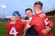 15 May 2023; Cork manager Ben O'Connor celebrates with Darragh O'Sullivan, 4, and James Dwyer after their side's victory in the oneills.com Munster GAA Hurling U20 Championship Final match between Cork and Clare at TUS Gaelic Grounds in Limerick. Photo by Piaras Ó Mídheach/Sportsfile