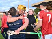 15 May 2023; Cork captain Michael Mullins celebrates with his manager Ben O'Connor after their side's victory in the oneills.com Munster GAA Hurling U20 Championship Final match between Cork and Clare at TUS Gaelic Grounds in Limerick. Photo by Piaras Ó Mídheach/Sportsfile