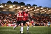15 May 2023; Michael Duffy of Derry City celebrates with Adam O'Reilly, left, after scoring their side's third goal during the SSE Airtricity Men's Premier Division match between Derry City and Dundalk at The Ryan McBride Brandywell Stadium in Derry. Photo by Ramsey Cardy/Sportsfile
