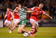 15 May 2023; Johnny Kenny of Shamrock Rovers is tackled by Tom Grivosti of St Patrick's Athletic resulting in a penalty for Shamrock Rovers during the SSE Airtricity Men's Premier Division match between Shamrock Rovers and St Patrick's Athletic at Tallaght Stadium in Dublin. Photo by Stephen McCarthy/Sportsfile