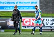15 May 2023; Darragh Leahy of Dundalk leaves the pitch with an injury during the SSE Airtricity Men's Premier Division match between Derry City and Dundalk at The Ryan McBride Brandywell Stadium in Derry. Photo by Ramsey Cardy/Sportsfile