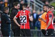 15 May 2023; Derry City head coach Ruaidhrí Higgins in conversation with Jordan McEneff, 22, and Michael Duffy during the SSE Airtricity Men's Premier Division match between Derry City and Dundalk at The Ryan McBride Brandywell Stadium in Derry. Photo by Ramsey Cardy/Sportsfile