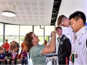 13 May 2023; Maria King from Bus Éireann presents the gold medal to Daragh Horgan of Monaleen in Limerick for the Boys 16 & under 50 metre backstroke event during the Community Games Swimming Finals 2023 at Lough Lanagh Swimming Complex in Castlebar, Mayo, which had over 800 children participating. Photo by Piaras Ó Mídheach/Sportsfile