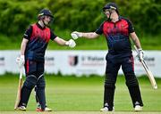 16 May 2023; Neil Rock, left, and Tyron Koen of Northern Knights celebrate a run during the CI Inter-Provincial Series 2023 match between Leinster Lightning and Northern Knights at Pembroke Cricket Club in Dublin. Photo by Brendan Moran/Sportsfile