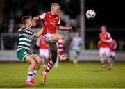 15 May 2023; Tom Grivosti of St Patrick's Athletic in action against Johnny Kenny of Shamrock Rovers during the SSE Airtricity Men's Premier Division match between Shamrock Rovers and St Patrick's Athletic at Tallaght Stadium in Dublin. Photo by Stephen McCarthy/Sportsfile