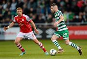 15 May 2023; Jack Byrne of Shamrock Rovers in action against Eoin Doyle of St Patrick's Athletic during the SSE Airtricity Men's Premier Division match between Shamrock Rovers and St Patrick's Athletic at Tallaght Stadium in Dublin. Photo by Stephen McCarthy/Sportsfile