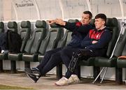 15 May 2023; St Patrick's Athletic interim manager Jon Daly and injured St Patrick's Athletic player Joe Redmond before the SSE Airtricity Men's Premier Division match between Shamrock Rovers and St Patrick's Athletic at Tallaght Stadium in Dublin. Photo by Stephen McCarthy/Sportsfile