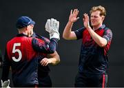 16 May 2023; Matthew Foster of Northern Knights, right, celebrates with teammates after taking the wicket of Adam Rosslee of Leinster Lightning during the CI Inter-Provincial Series 2023 match between Leinster Lightning and Northern Knights at Pembroke Cricket Club in Dublin. Photo by Brendan Moran/Sportsfile