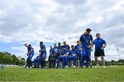 16 May 2023; The Leinster Lightning team disperse after a team photograph during a break in play in the CI Inter-Provincial Series 2023 match between Leinster Lightning and Northern Knights at Pembroke Cricket Club in Dublin. Photo by Brendan Moran/Sportsfile