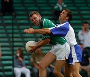 13 June 2004; Mike O'Brien, Limerick, in action against Conan Watt, Waterford. Bank of Ireland Munster Senior Football Championship Semi-Final, Limerick v Waterford, Gaelic Grounds, Limerick. Picture credit; Pat Murphy / SPORTSFILE