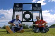 21 June 2004; Rival captains Ken McGrath, left, and Ben O'Connor, Cork, go head to head in advance of the Guinness Hunster Hurling Final. Ken and Ben are pictured testing their skills at the launch of the Guinness Training Booth, which makes it's debut appearance at next Sunday's Guinness Munster Hurling Final in Thurles. Picture credit; Brendan Moran / SPORTSFILE