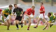 13 June 2004; Conor McCarthy, Cork, in action against Eamonn Fitzmaurice, left, and William Kirby, Kerry. Bank of Ireland Munster Senior Football Championship Semi-Final, Kerry v Cork, Fitzgerald Stadium, Killarney, Co. Kerry. Picture credit; Brendan Moran / SPORTSFILE