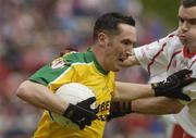 20 June 2004; Brendan Devenney, Donegal, in action against Ryan McMenamin, Tyrone. Bank of Ireland Ulster Senior Football Championship Semi-Final, Donegal v Tyrone, St. Tighernach's Park, Clones, Co. Monaghan. Picture credit; Pat Murphy / SPORTSFILE