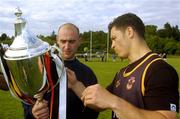 21 June 2004; Bradford Bulls captain Robbie Paul, right, and Meath captain Paddy Reynolds admire the World Club Challenge Trophy before a Meath football and Bradford Bulls Rugby League training session. Dalgan Park, Navan, Co. Meath. Picture credit; Damien Eagers / SPORTSFILE