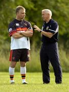 21 June 2004; Bradford Bulls coach Brian Noble, left, speaks with Meath manager Sean Boylan at a Meath football and Bradford Bulls Rugby League training session. Dalgan Park, Navan, Co. Meath. Picture credit; Damien Eagers / SPORTSFILE