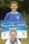 22 June 2004; The eircom League FAI Pepsi Summer Soccer Schools Kids Go Free Promotion was launched today. Pictured at the launch is Noelle Brennan aged 12 from Dublin and Dylan Kirby aged 12 from Beaumont. Portmarnock Hotel & Golf Links, Strand Road, Portmarnock, Co Dublin. Picture credit; Damien Eagers / SPORTSFILE